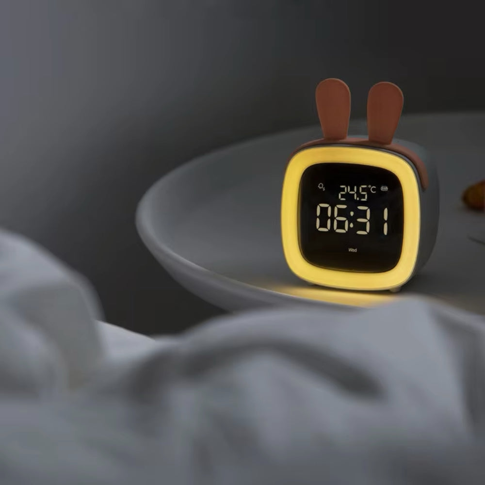 Otroška budilka z nočno lučko